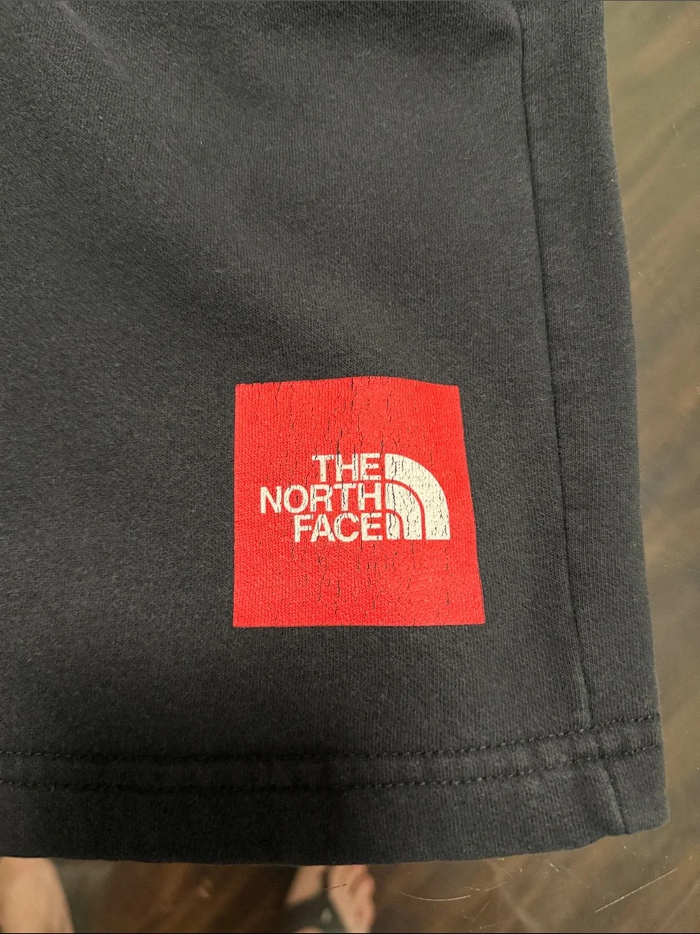 The North Face Men’s Black Athletic Shorts with Red Logo Patch 6”